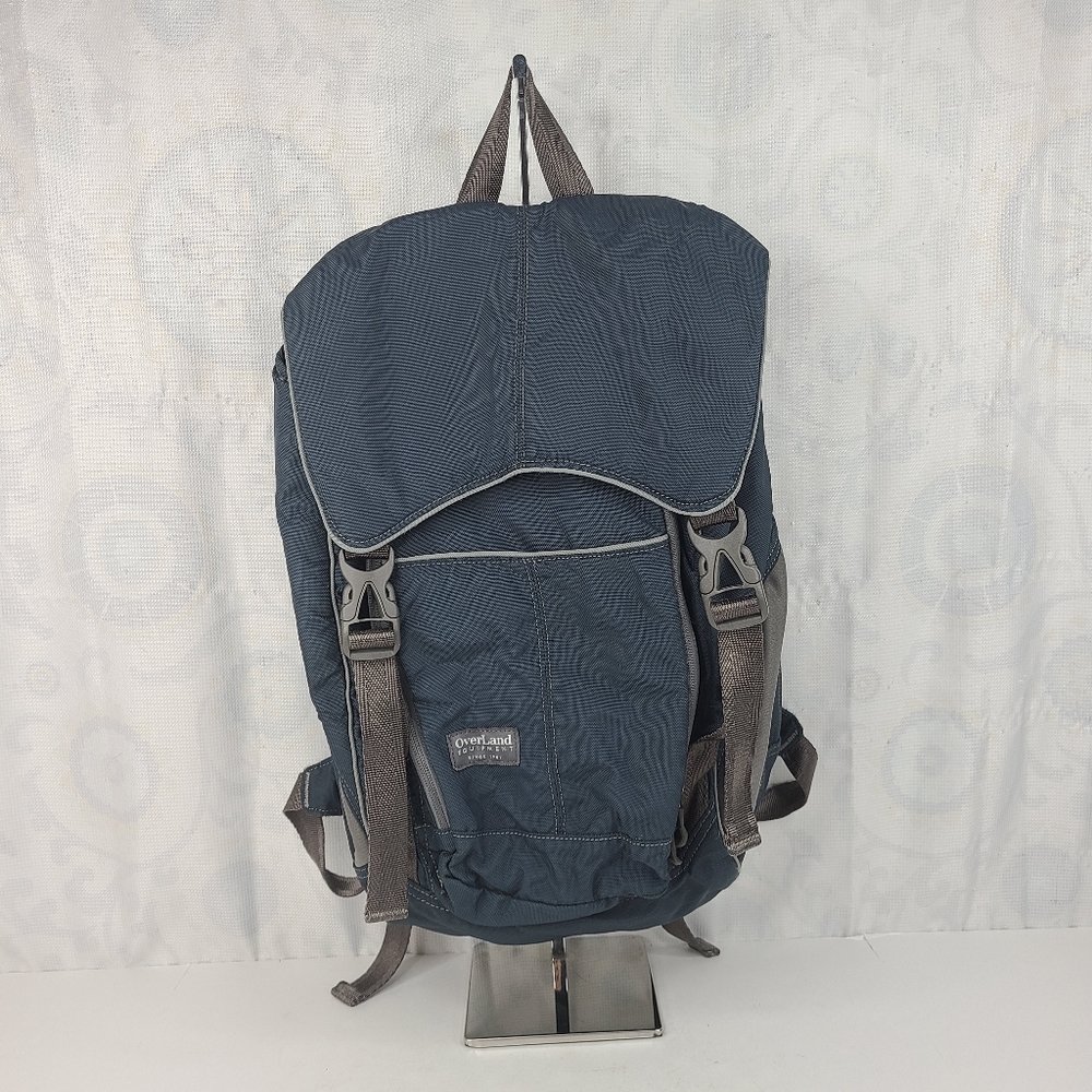 Overland Equipment blue and gray multi-compartment multi-purpose backpack